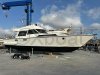 Bateau à Moteurs d'occasion GUY COUACH 1400 FLY